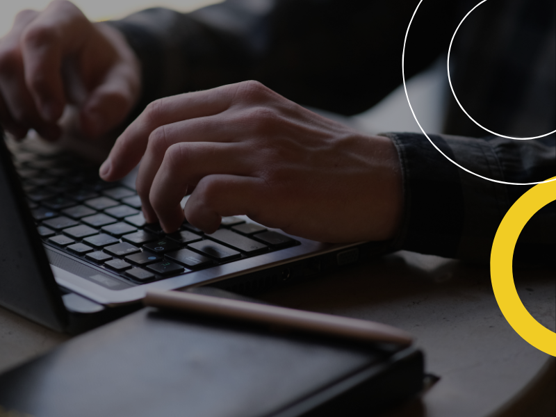 Person typing on computer